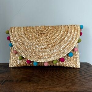 Urban Expressions Straw Clutch with Pom Pom Trim – Woven Summer Crossbody Bag